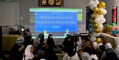 Teacher guiding students